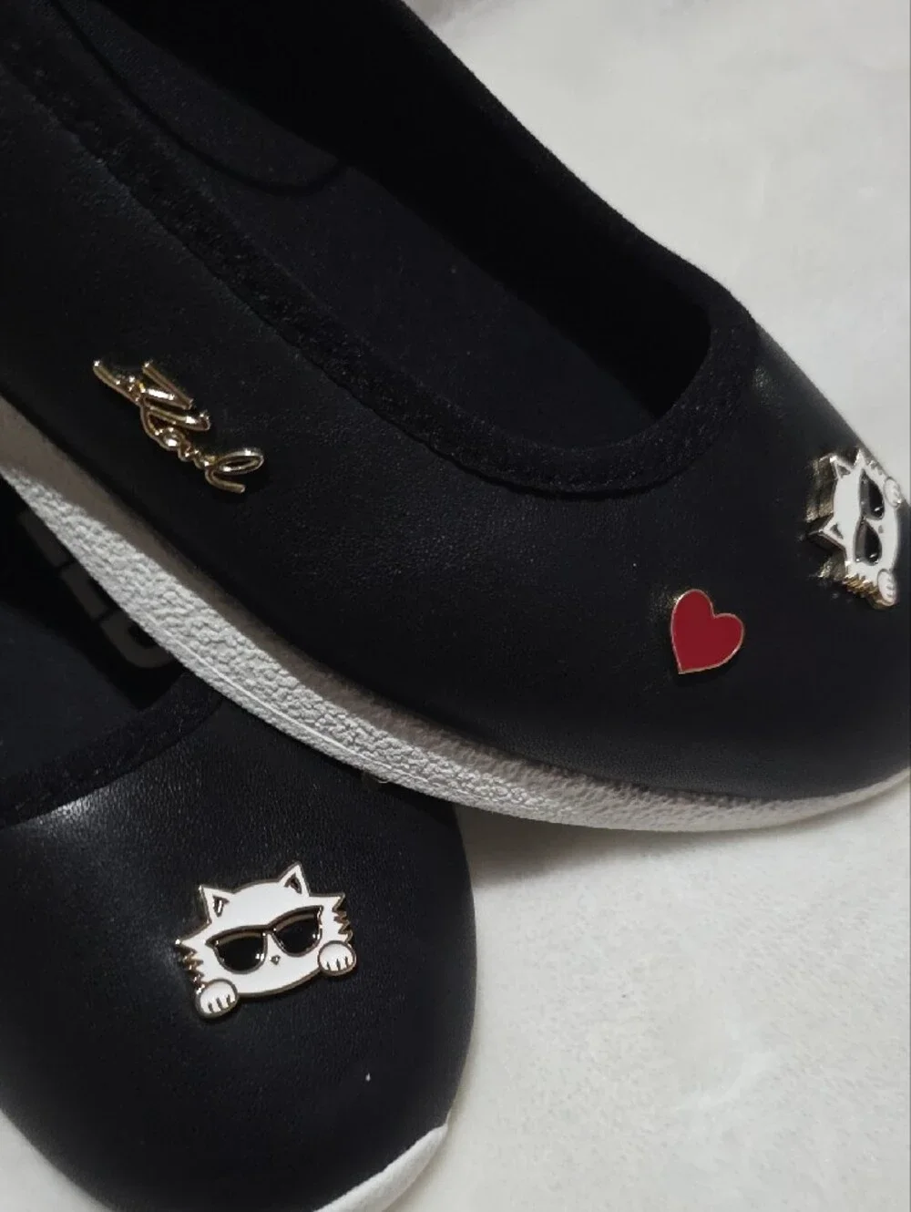 Karl Lagerfeld Black Ballet Flats with White Sole and Cat Charms